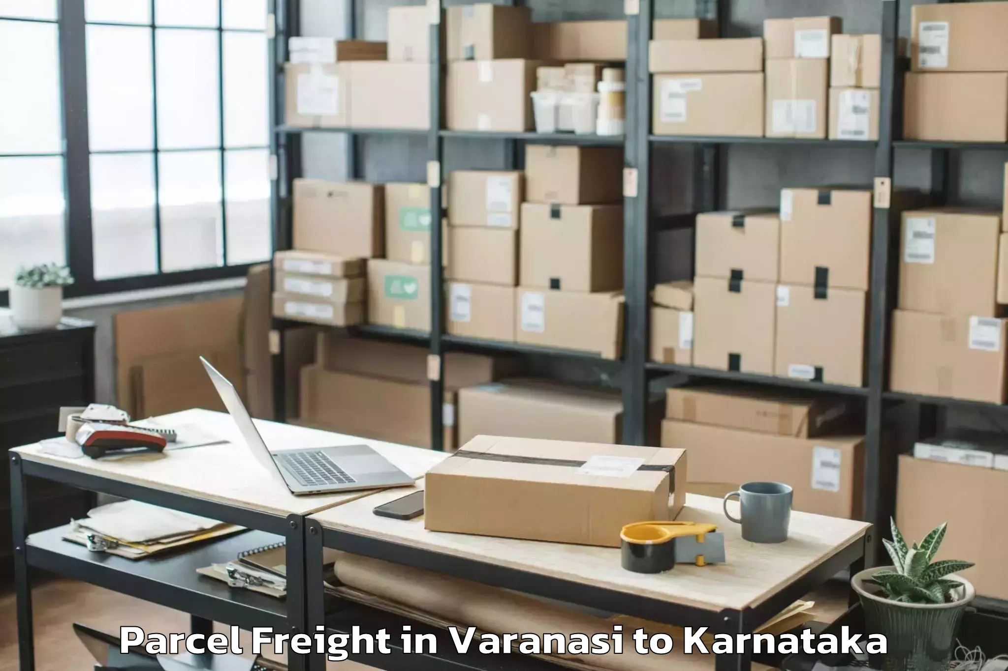 Reliable Varanasi to Munirabad Parcel Freight